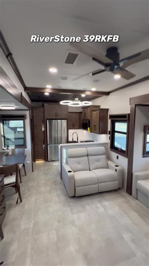 Luxury, Convenience, and Class—All in One Fifth Wheel! Step into the Forest River RiverStone 39RKFB and experience the ultimate in full-time RV living. This high-end fifth wheel is loaded with premium features: • Private rear kitchen with upscale finishes • Theater seating for movie nights in comfort • Dedicated desk space for work or creativity on the road • Both a full and half bath for total convenience • Spacious walk-in closet and stackable washer/dryer • Generator and 4-camera system for f