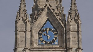 Analog clock on a church tower - Free Stock Video