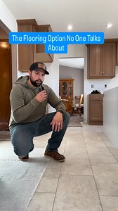 The flooring option no one talks about - vinyl tile. This is a product that looks like ceramic/porcelain tile without the drawbacks. With vinyl tile there are: 1. No grout lines to clean 2. No cold to the touch feel like you get with tile - especially in the winter months Bonus - it’s a really versatile floor covering that pairs well with a lot of looks | Riverbend Kitchens