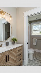Be sure to save this smart & practical bathroom layout! Paul & I toured a home in our neighborhood that had this same corner Jack ‘n Jill bath layout. We loved the concept so much and finally got to use it in this rehab that we finished in early 2023. The best part in my mind is the completely separate vanity spaces. Talk about a dream! (My sister & I definitely could have benefitted from separate vanities growing up! 😉) The one tricky design aspect of this layout is figuring out the plumbing a