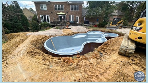 The Desert Springs pool model in the color Granite. The Desert Springs model features a built-in spa, a tanning ledge with steps leading to the pool. Its modern curves create a natural nook for a spa model or a sheer descent waterfall. San Juan Fiberglass Pools #FiberGlassPools #pooldesign | Poolscapes of Charlotte | Facebook