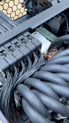 We've just uncrated the most powerful desktop we've ever had in the lab for review. The Comino Grando workstation has 6x liquid-cooled NVIDIA 4090 GPUs, a liquid-cooled CPU and beefy fans and PSUs to run this monster. We have a review in process and intend to virtualize the box to share 4090s with our Discord community. Much more to come! Comino Liquid Technology #computers #workstation #GPU #nvidia #4090 #liquidcooling #tech #pcgaming | StorageReview