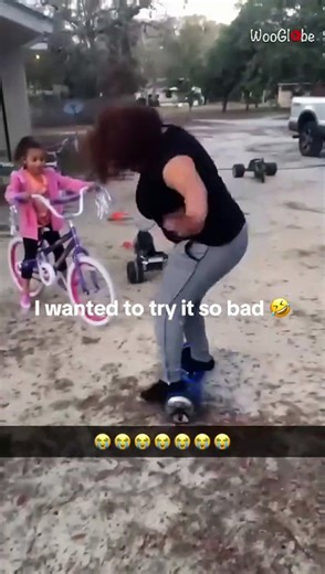 Girl hops on hoverboard for the first time and learns balance the hard way