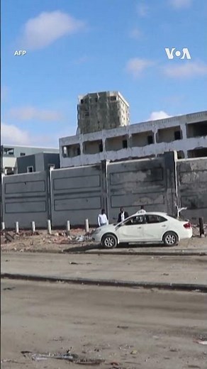 People Clear Rubble Day After Twin Blasts Rock Somali Capital #shorts | VOA News