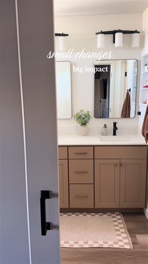 our builder grade master bath is a work in progress, but a little paint and some new mirrors can make a huge difference 🤍🤎✨ #modernorganic #homeinspiration #cozyhome #moodyaesthetic