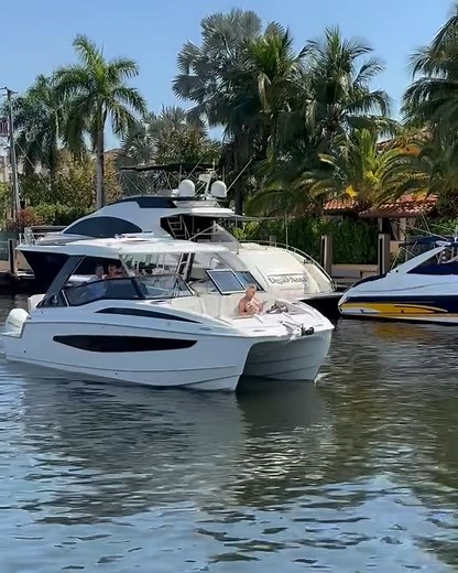 Delivery days are the best days! Cheers to the new owners of this gorgeous Aquila 32 — enjoy every moment on the water! | MarineMax Pompano Beach