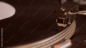 Record player playing an old fashioned vintage vinyl record