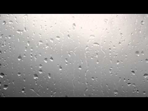 Rainy Window, Raindrops on Window Dark Clouds Background - Stock Video - OrangeHD.com