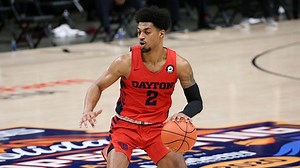 Joe Burrow watches Ibi Watson, former Athens HS teammate, help Dayton to win at UD Arena