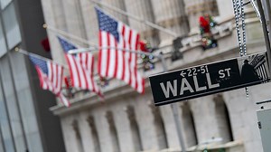 American Express profit sinks 76%