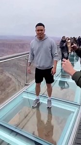 35K views · 338 reactions | Guy “Tests” a Glass Bridge… It Breaks and He Drops (Luckily It’s Not High) He starts jumping on a glass bridge to prove it’s strong… and it actually cracks. The panel gives way and he falls through—thankfully the drop isn’t huge, so he lands мягко and survives. Still: worst idea ever. #glassbridge #crash #fail #viral #reels | The.worldai | Facebook