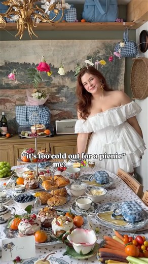 Noelle Downing ✨ on Instagram: "The ice and snow outside had me daydreaming about warmer weather, so I decided to bring a little spring indoors with a cozy picnic and my favorite ladies 🤍🌼🩵 I’ve been loving my @calpak pieces for everyday life and travel, especially the Luka duffel, packing cubes, and their luggage. Truly staples for me 😍When I saw the spring collection in French Blue Gingham, I knew it deserved a little celebration. Such a fresh, timeless color for the season 💙 #calpakpartn