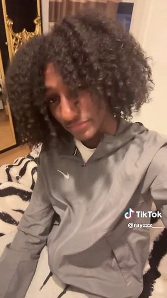 Curly Hair Boy: Embracing Eritrean Culture