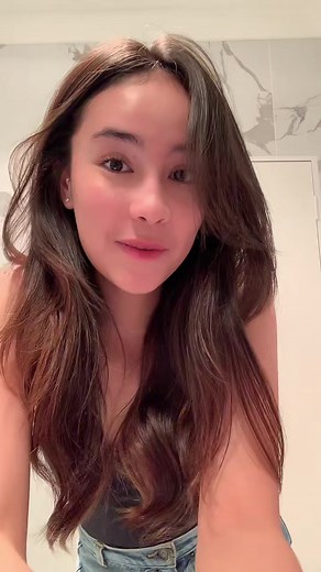 Hair Styling Tips in a Modern Bathroom Setting