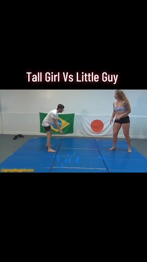 Tall Girl Wrestles Short Guy: See Who Wins!