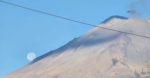 Photographer Couple Captures Photo of 'UFO' Above Erupting Volcano