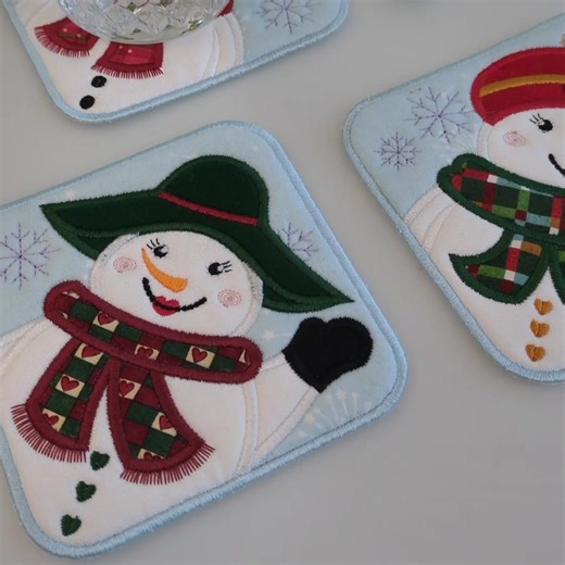 4.1K views | ✨ Let it snow… in your hoop! ✨ Create a set of charming winter-themed coasters with the Let it Snow Coasters ITH design. ⛄ ✔️ For 4x4, 5x5 and 6x6 hoops ✔️ Perfect for relaxing stitching days & gorgeous gift sets  Make a set today and bring a touch of winter to your home. | Sweet Pea Machine Embroidery | Facebook