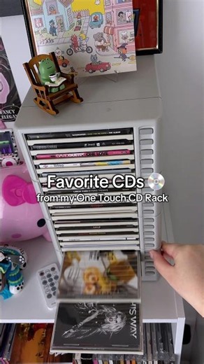 One-Touch CD rack! Favorite CDs 💿 ♡ #cdcollection #cdcase #2000s #physicalmedia #thriftfinds