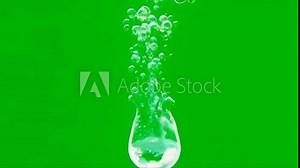 green water drop,Ultra-slow motion drop rebounding on rippling green water