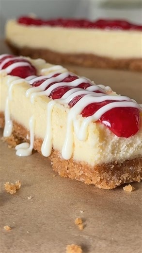 If you remember Philadelphia cheesecake bars, then you owe it to yourself to taste them one more time! Crispy graham cracker, sweet cheesecake, strawberry topping, and white chocolate drizzle… What's not to love? For full recipe, visit www.saltnsprinkles.com Saltnsprinkles | Tasty