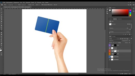 Business Card in a Hand Mockup - AG Mockups