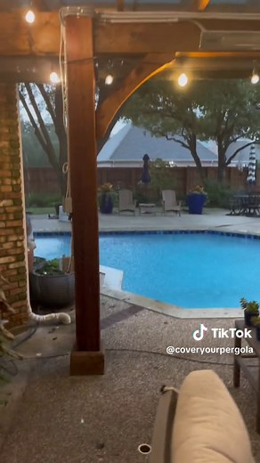 Cover your pergola with SkyPoly. Stay dry. Stay out of the rain. #pergola #patiocover #skypoly #pergoladesign #patioseason