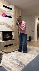 Playful prank: Man tricks wife with TV while vacuuming. | Tips & Tricks