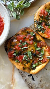 39K views · 1.6K reactions | Three types of garlic in one butter...black garlic brings this molasses-like depth, fresh garlic provides the bite, and confit garlic adds silky richness - all bound together with butter, parsley, and caraway seeds. Spread it on pita (homemade or good shop-bought), top with grated summer tomatoes, and serve as part of a mezze spread. Or eat it standing in the kitchen while everyone else is setting the table. Recipe in my profiles link in bio | Ottolenghi | Facebook