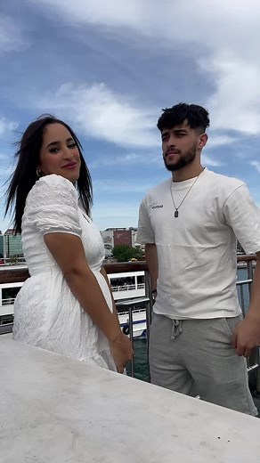 Couple's Balcony Moments with Scenic City Views