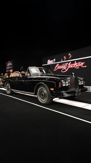Catch up with Tyler Hoover of Hoovie's Garage and Adam Ferrara for the sale of this matching-numbers 1988 Rolls-Royce Motor Cars Corniche II convertible. Watch until the end and see how much it sold for! Watch more on YouTube: https://youtu.be/f-Vj-5TmmuI | Barrett-Jackson
