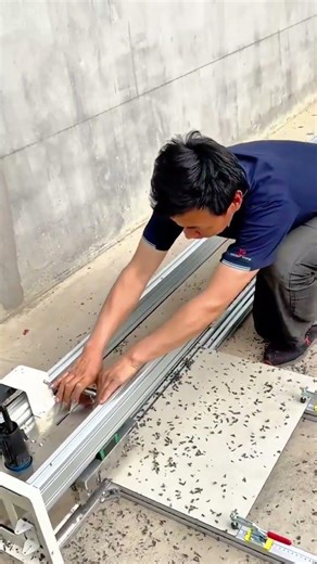 cutting the large floor tile material using a professional manual rail tile cutter machine tools