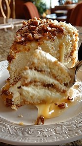 28K views · 421 reactions | White German Chocolate Cake with a Cheesecake Center Ingredients For the Cheesecake Center: ½ cup granulated sugar 2 large eggs 1 teaspoon vanilla extract 2 (8 oz) packages cream cheese, softened | Happy Recipes | Facebook