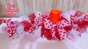 How to make a table swag for Valentine’s Day using Dollar Tree items #dollartree #dollartreedecor #dollartreevalentines #dollartreediy #dollartreecrafts #valentinesdecor #valentinesswag #valentineswreath #valentinescrafts | Glam Candy Boutique