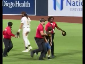 Kid RUNS ON FIELD, TACKLED HARD at Padres Game!