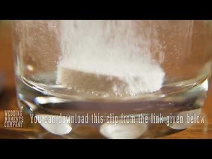 Effervescent tablet falling in water