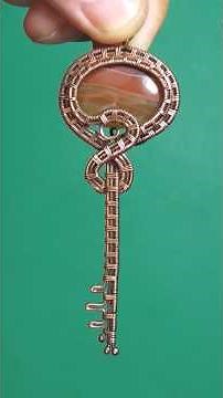 Handmade necklace with pendant Key. Handmade wire weaving Pendant made of natural stones and wire.
