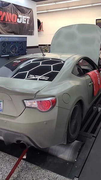 The Transformation from Stock to Not on this 2013 FRS. Wrapped in Satin Khaki Green, Installed a Spectrum Motorsports FA20 Turbo Kit that was coated in house using Cerakote Glacier Black on the hot side and some Red Powder Coat on the Intake side. Engine monitoring is done with a set of Glowshift Guages and features Flex Fuel. #frs #turbo #dynojet #dyno #averydennison #cerakote #powdercoat #tune #boosted #builtnotbought #spectrummotorsports #willowbrookperformance #tellyourkittyisaidpspspsps #Ca