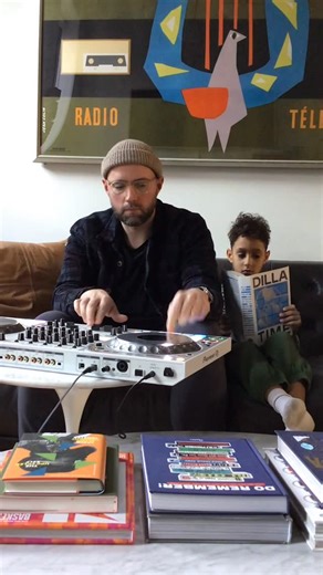 MICK on Instagram: "Before we built the vinyl set-up downstairs, I used to do blends in my living room on a controller. And with everyone sharing their favorite #dilla moments today, I had to resurface this clip from 2024. Usher singing over Slum Village “Climax” 🔥 One of my fave remixes I ever did - I still open so many of my sets with this version! Myles was 8 then - and looks so much younger - but definitely was still keeping up w/ classic reading material. 💙 Hope you enjoy it! (Deejay frie