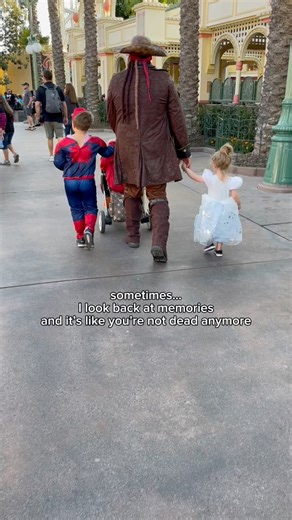 Four years ago today. Two little hands in yours, a moment I’d give anything to relive. Sometimes memories make it feel like you’re not gone at all. And my heart is shattered all over again. | Nicole Halpin