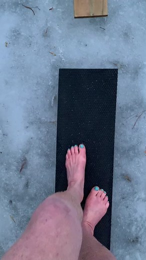 On thin ice and feeling the cold. Yeah I love it. #nofear of dark, leafy, water. #barefoot #ice