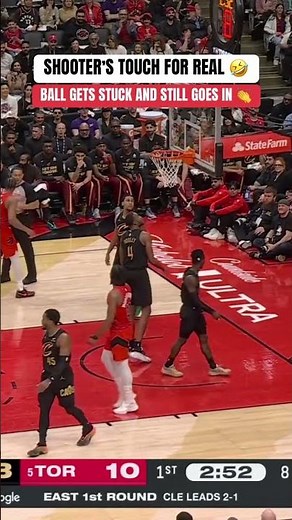 The ball got stuck perfectly at the top of the backboard