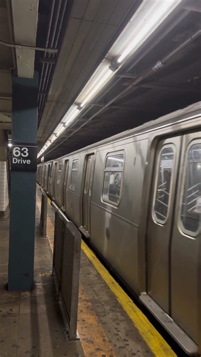 Forest Hills bound R160A-1 M arriving at 63 Drive-Rego Park