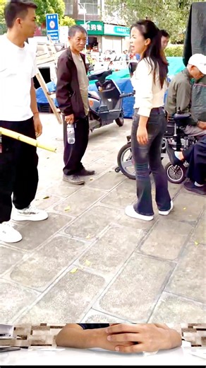 Bamboo Battle in Public! 😂 Husband vs. Wife Street Fight! When a couple's argument turns into a funny bamboo stick fight in the middle of the street! 😂 The drama is real! Watch and enjoy! Tag a friend who fights like this! #Funny #Comedy #CoupleGoals #Relationship #StreetFight #Bamboo #ViralReel #FacebookReels | M.aiutullah
