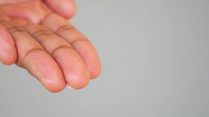 Download Hand gesture showing lotion on hand for free