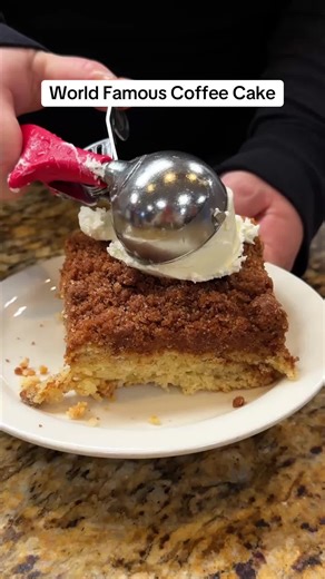 Is this the most famous Coffee Cake in the world? ☕🍰 Carolyn's Cafe in Redlands, CA, is known for their legendary coffee cake. The owner perfected the recipe that was based on the memory of her late grandmother's coffee cake. The crazy thing is they don't even take measurements, they make the cake all by feel and it draws lines out the door every day! Carolyn's cooks up 30 pans a day and sell out every time. Some people even order this as their wedding cake. We gave @Marc Kharrat and @Food With