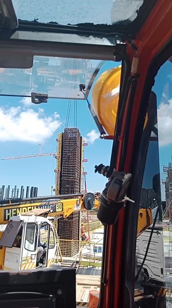 Construction Vehicles in Action at a Busy Site