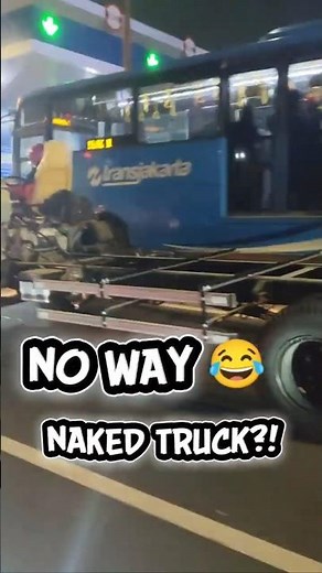OMG! 😱🚚🪖 Naked Truck Driven by Helmeted Driver on Highway!