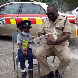 Deputy Superintendent of Police Kevin Francis, Operations Officer for St. Ann, participated in Read Across Jamaica Day. #aforce4good | Jamaica Constabulary Force