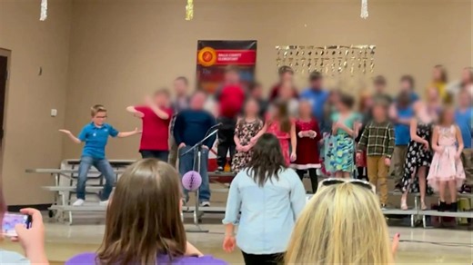 All eyes on me - Hilarious moment young boy steals the show with his freestyle dance moves at school performance