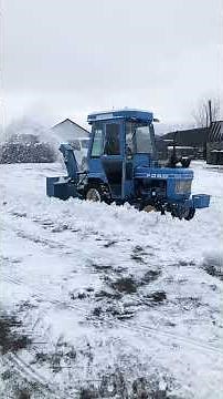 1985 Ford 1210 tractor and snowblower, removing snow. A look at the clear coat on Ferguson blade.